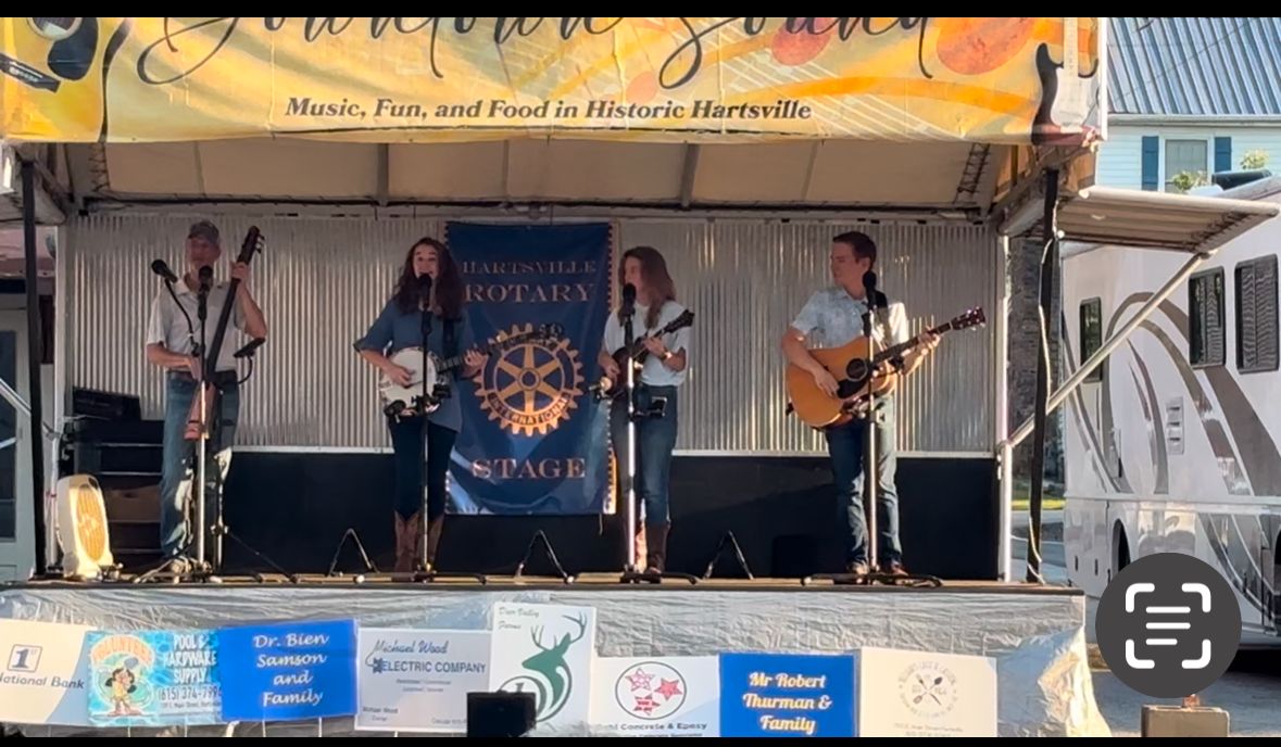 Band singing at Downtown Sound